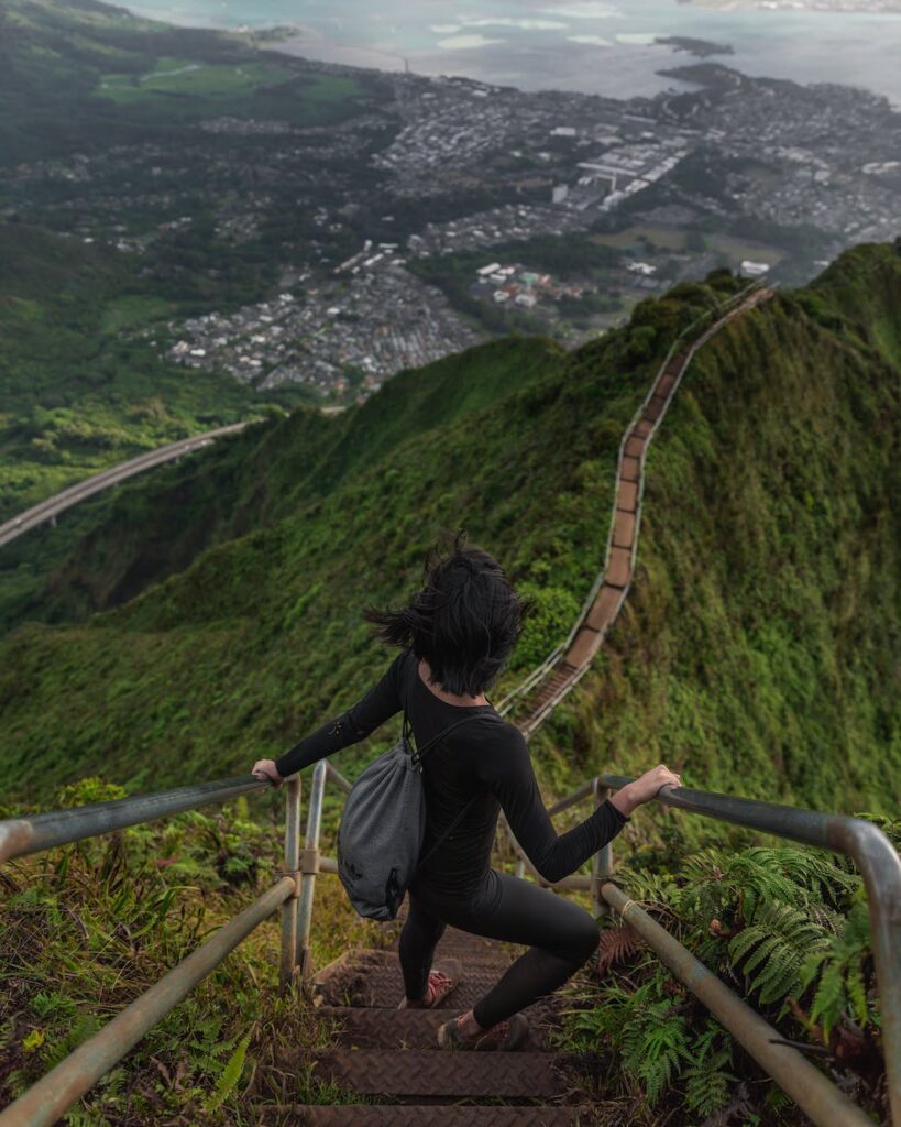 high angle photo of person going down the stairs